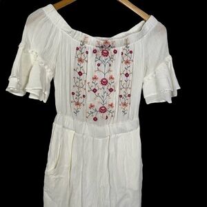 Blue Rain embroidered short white romper.